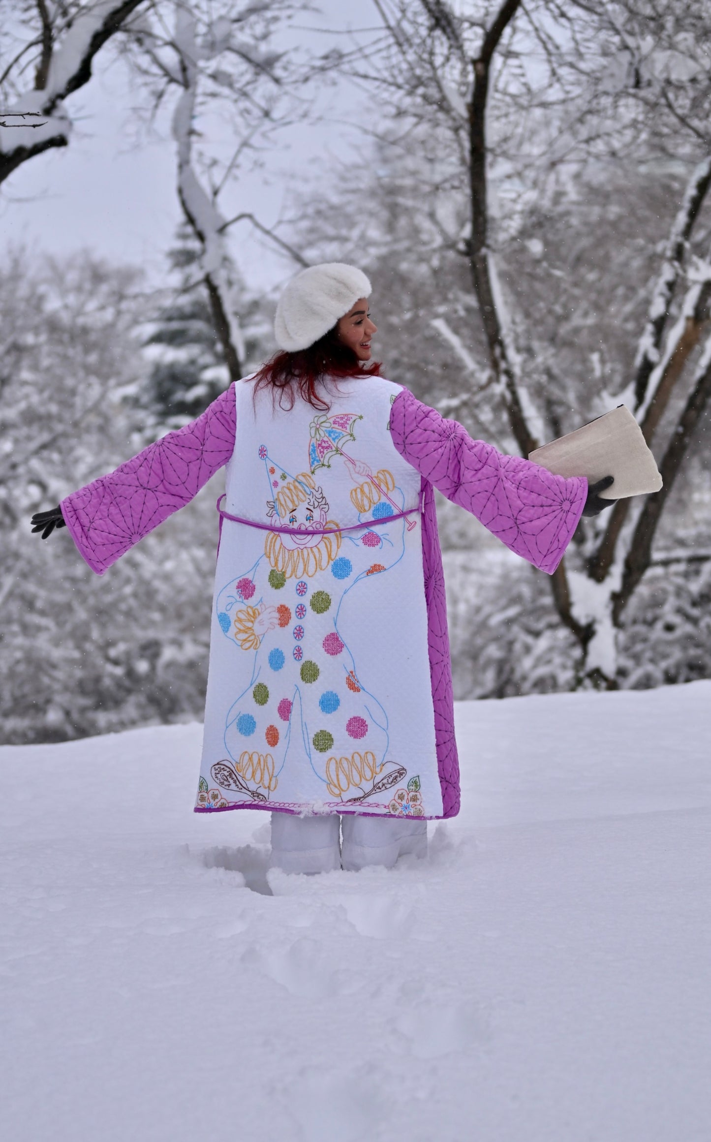 Embroidered clown quilted long coat